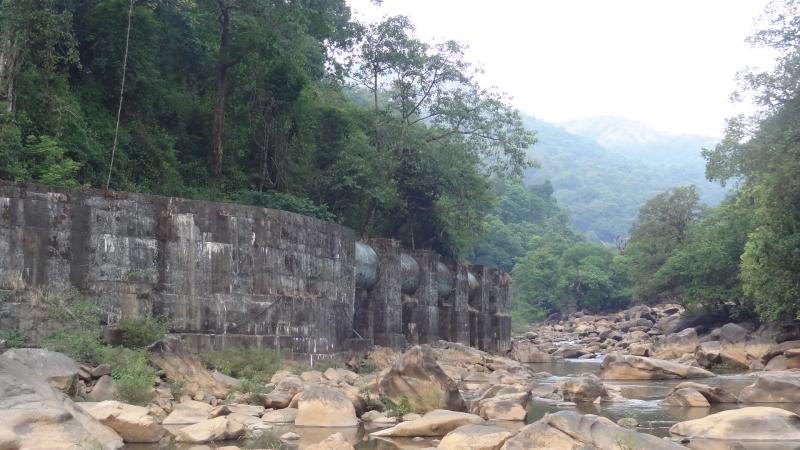 A view of the penstock pipe diverting river flows from the weir to the powerhouse. These structures can drastically impede the movement of wild animals such as elephants.