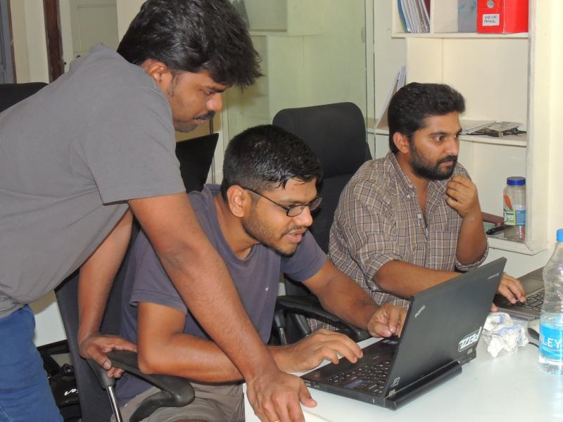 Participants figuring out some code.